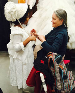 Rigel Blue Pierce-English (Tiny Tim/Ensemble) and Deborah Strang (Ghost of Christmas Past/Ensemble) backstage. Photo by Taleen Shrikian.