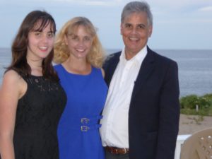 Greg with his wife and daughter. 